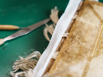 Preparation for a new spine on a book